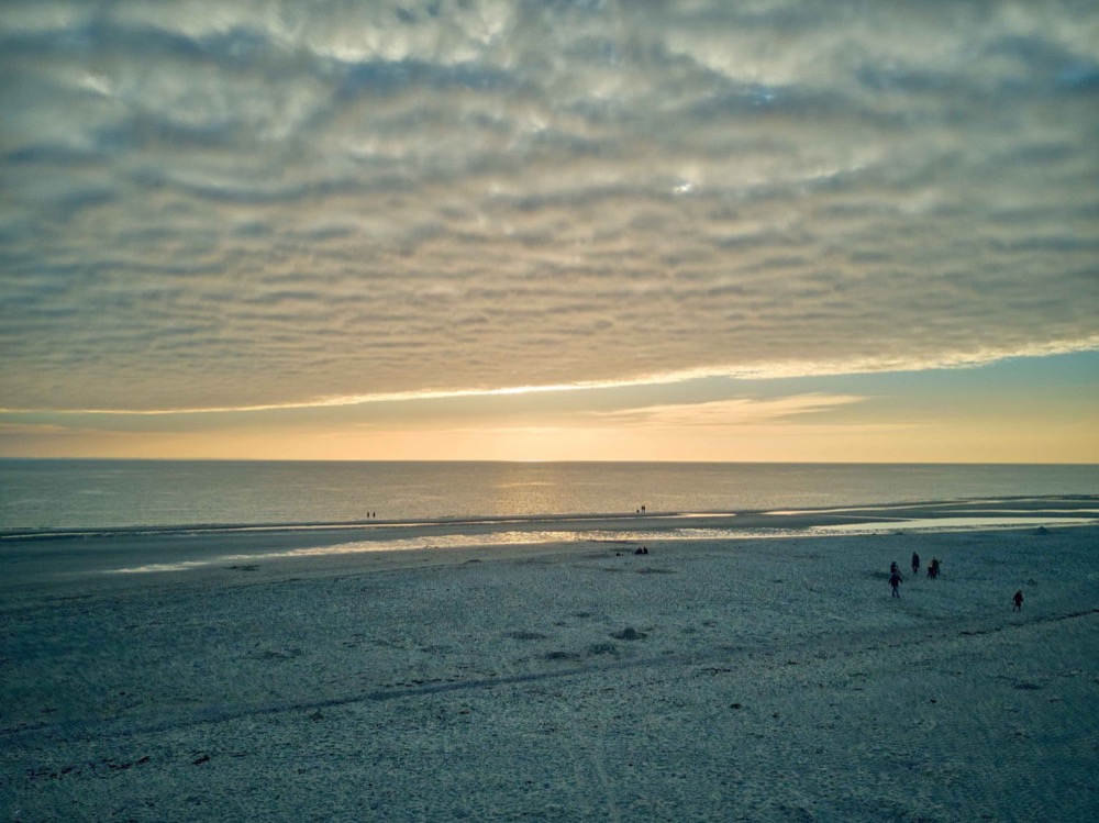 Beach at low tide at sunset, seen from above